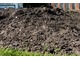 Góra kompostu na rabacie, gotowa do rozsypania